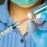 Diabetes Cure Breakthrough Stuns Scientists Healthcare professional preparing a syringe from a vial
