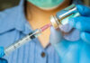 The Bold Bet On An Arthritis Drug For Depression Treatment Healthcare professional preparing a syringe from a vial