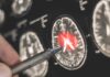 Cancer Mutations In Alzheimer’s Brains! A hand pointing at a brain scan with highlighted areas