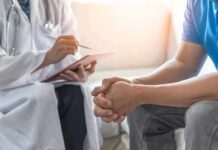 Prostate Cancer Screening—When to start Doctor consulting a patient on a sofa