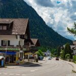 Cancer-Proof Village Stuns Scientists mountain village street with alpine houses and shops