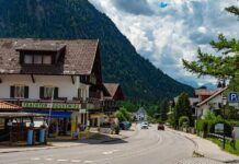 Cancer-Proof Village Stuns Scientists mountain village street with alpine houses and shops