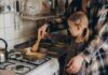 Microwave Cancer Myths Debunked — Here’s What Matters Child cooking with adult at a stove