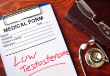 medical form on clipboard with stethoscope and glasses