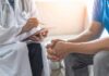 Big Medicine’s New Chronic Pain Solution Doctor consulting a patient on a sofa