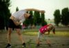 Exercise Goals for Every Age Group Man and young girl stretching outdoors
