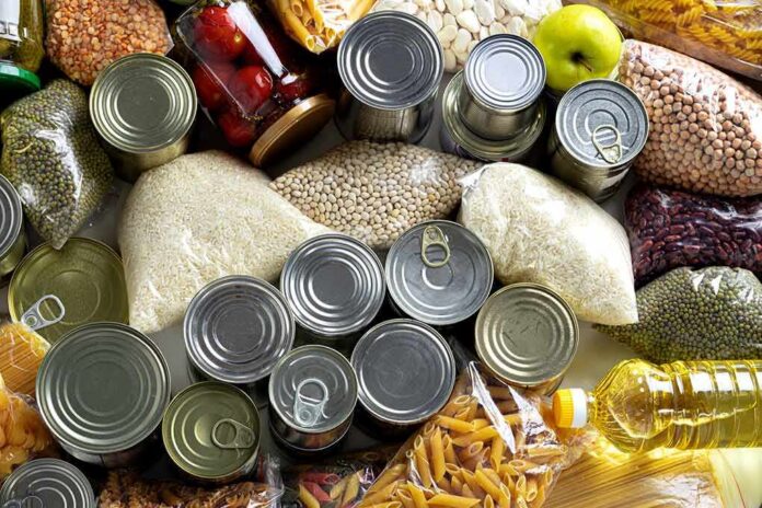 shutterstock_1694832673 Assorted pantry staples with canned goods and dry foods