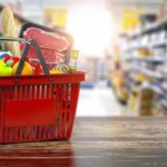 Supermarket Receipts Expose Surprising Ozempic Effect Red shopping basket filled with groceries on a store aisle