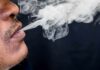 Brain Study Shreds Cannabis ‘Chill-Free’ Myth Close-up of a person exhaling smoke