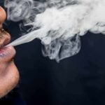 Brain Study Shreds Cannabis ‘Chill-Free’ Myth Close-up of a person exhaling smoke